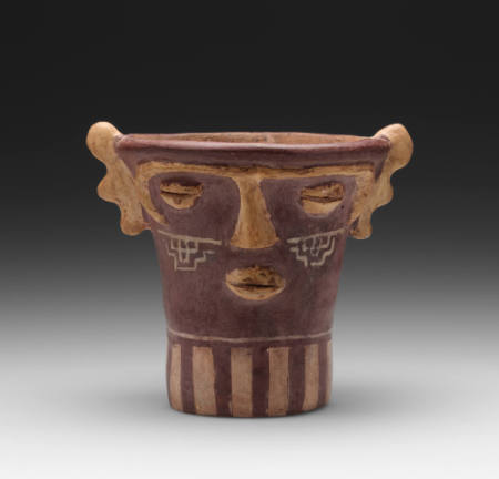 Anthropomorphic antlered quero (cup)