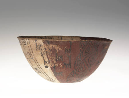 Bowl with stick-line designs of deer, and alternating red and buff color decoration