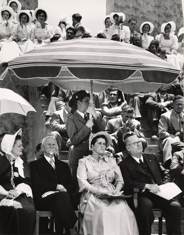 [People in grandstands]