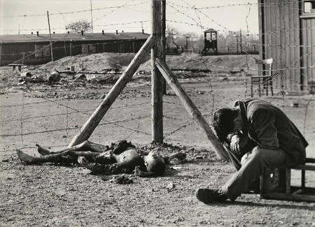 [Man grieving over dead companion, Erla, Germany]