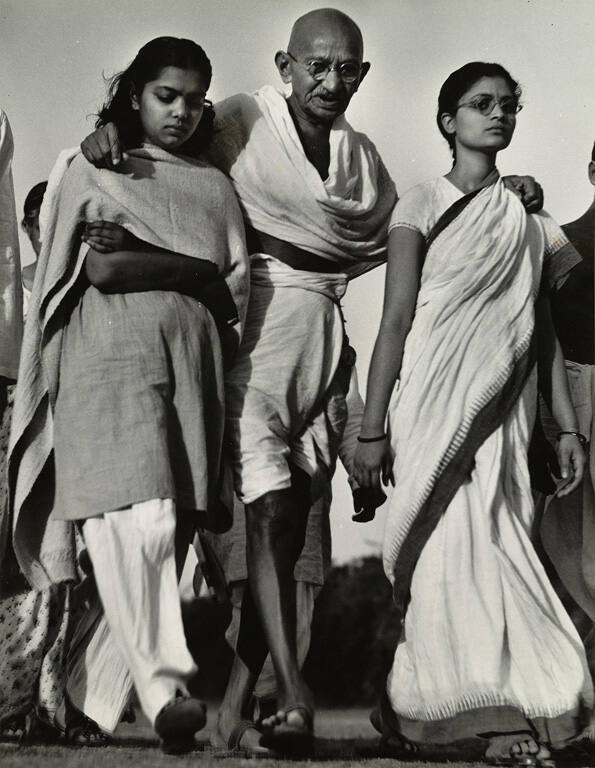 [Mohandas Gandhi on a morning stroll with his granddaughter Sita and grandniece Abbha, India]