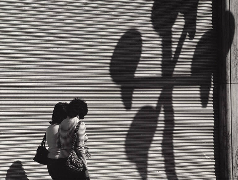 Dos Mujeres y la Gran Cortina con Sombras (Two Women, a Large Blind, and Shadows), from the portfolio Photographs by Manuel Álvarez Bravo