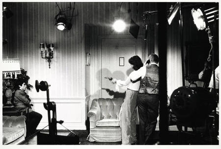 Untitled (Actress with gun on set with two actors), #7 from "Cinema Verite"