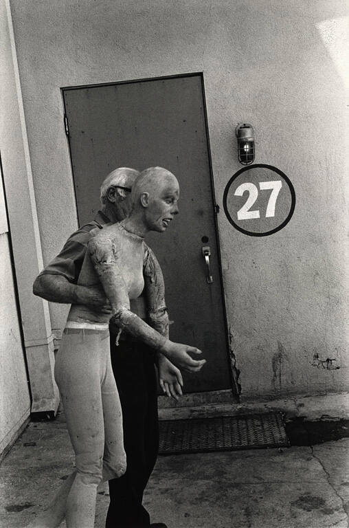 Untitled (Man carrying stunt dummy), #12 from 