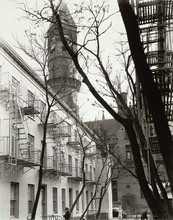 Patchin Place with Jefferson Market Court in background, opening off West 10th Street between Sixth Avenue and Greenwich Avenue, Manhattan, November 24, 1937
