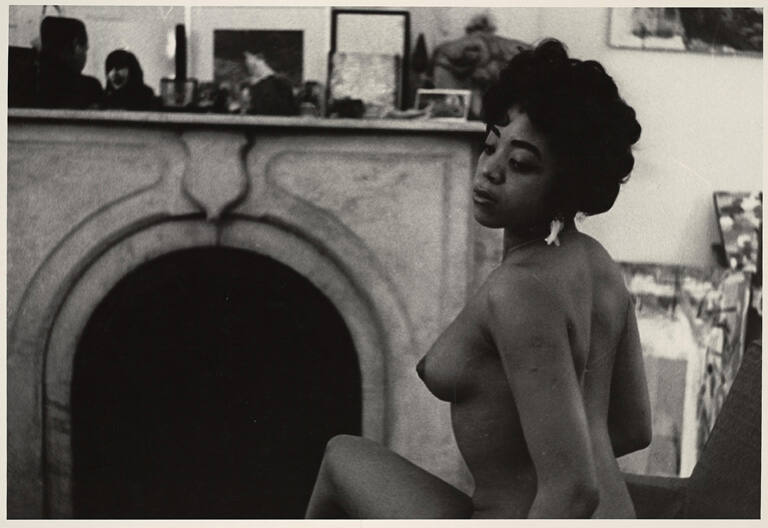 [Woman posing in Walter Gutman’s apartment, New York City]
