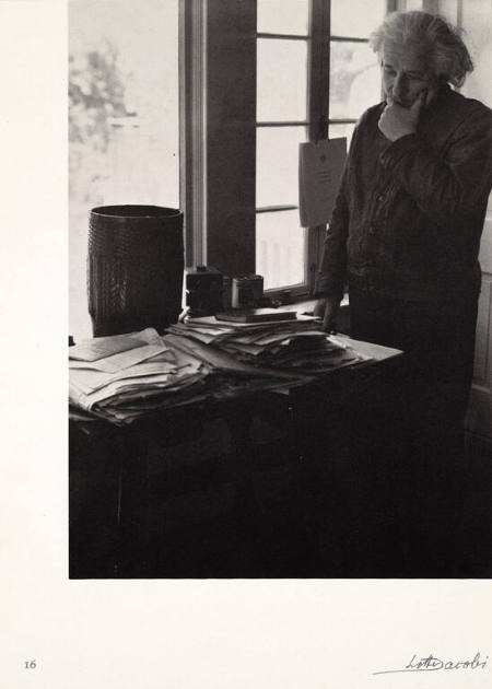 Albert Einstein looking at his daily mail, from Einstein Portfolio