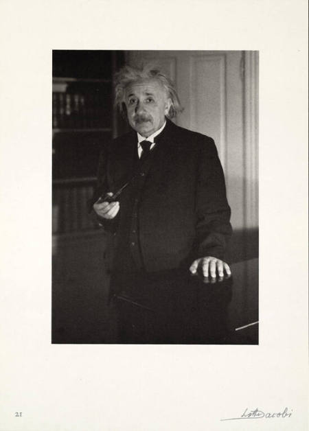 Albert Einstein standing at his piano, from Einstein Portfolio