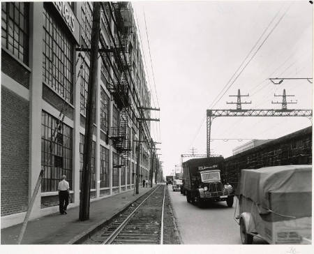 [Bassick Casters building and Howard Street traffic, New Haven, Connecticut]