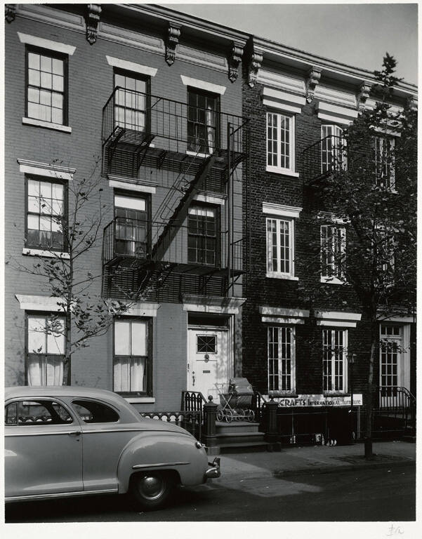 [Rowhouses with car]