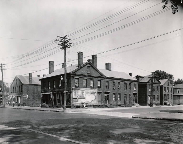 [Intersection with brick houses]