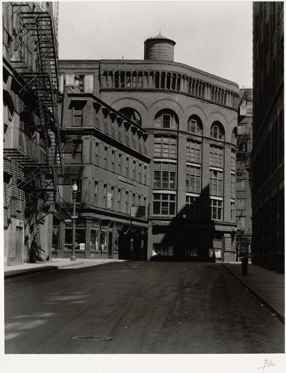 [Street view of brick building]