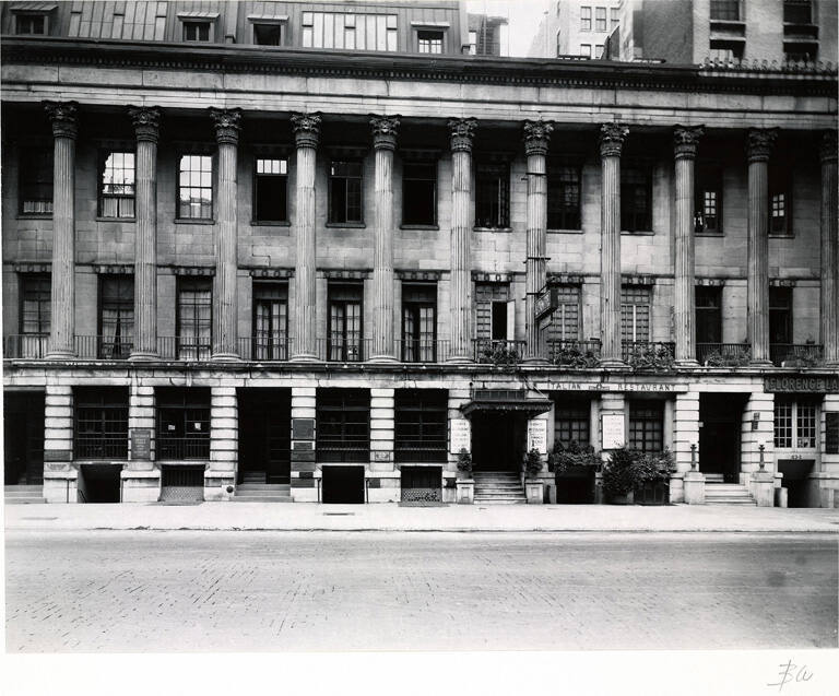 [Row of Neoclassical shops]