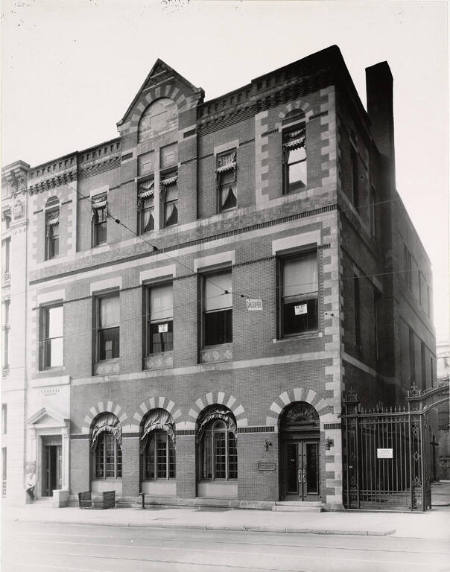 [Three-story brick office building]