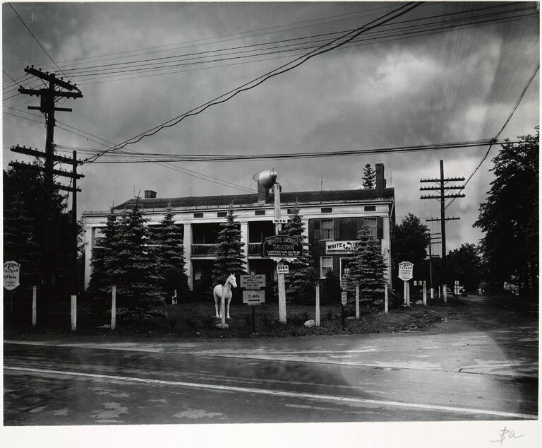 [White House Tavern and roadside signs]