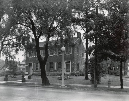 [Brick house with street lamp]