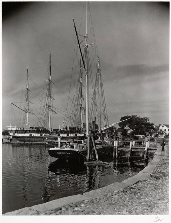 [Tall ships at docks]