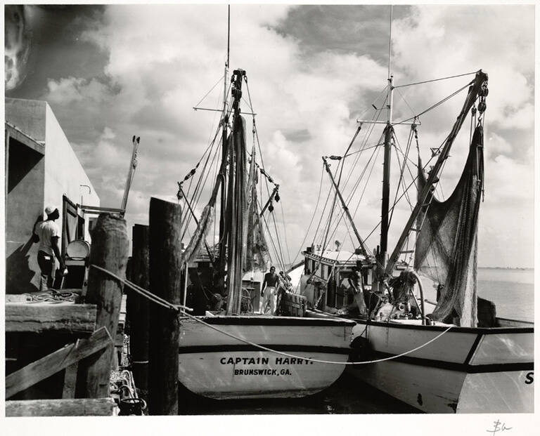 [Fishing boats at dock]