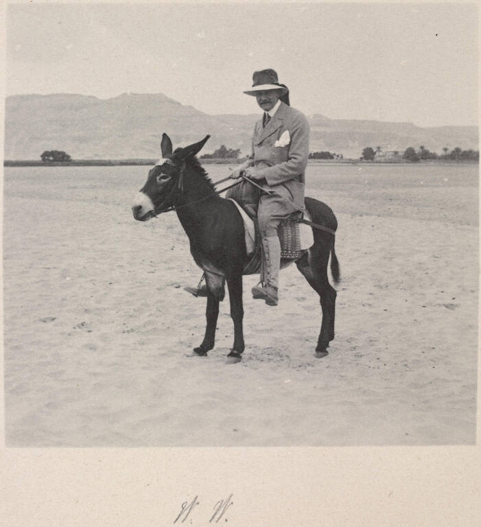 [W.W. riding a donkey]