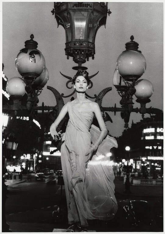 Model and street lamp, Vogue, Paris