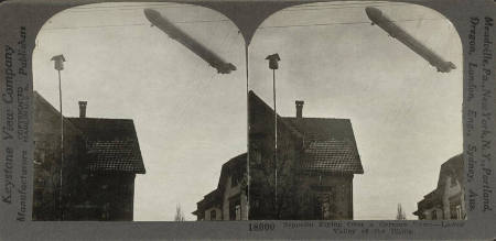 Zeppelin Flying Over a German Town - Lower Valley of the Rhine