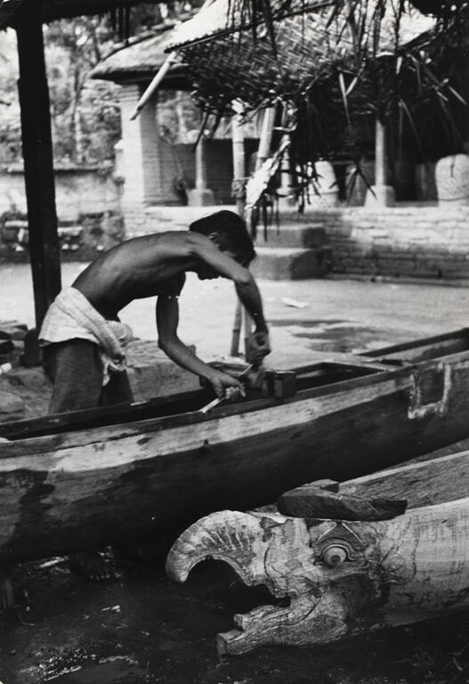 Craftsman at work on fishing boat, Sanur, Bali