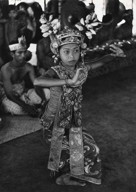 Young girl in ornate costume performing the classical Legong dance, Sanur, Bali