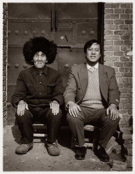 Untitled [two seated men: one in traditional dress; other in modern dress], from the portfolio New Photo, Ten Years 1997–2007