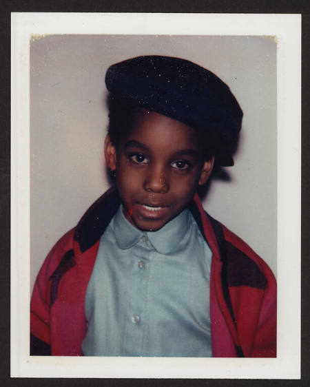 Unidentified boy (red jacket and cap)