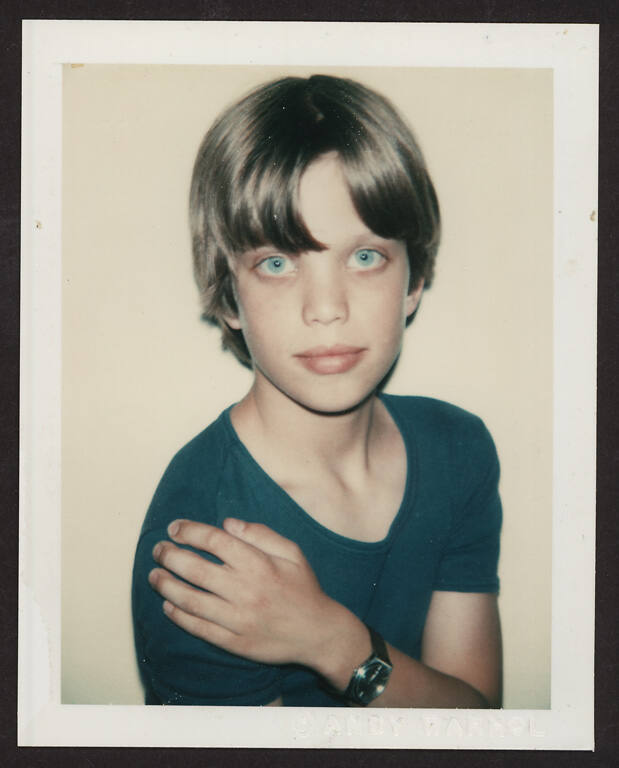 Unidentified boy (blue t-shirt)