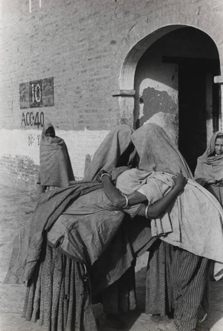 Weeping women finally reunited after being separated during the Indian partition