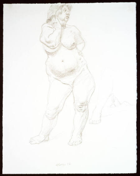 Standing nude with hand on hip