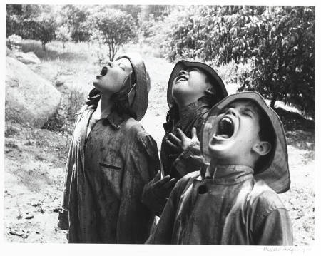 Children singing in the rain (Camp Tree Tops)