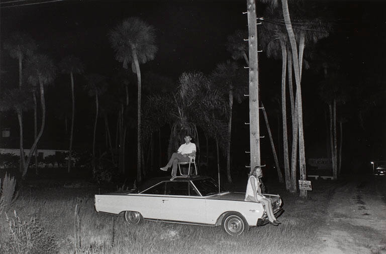 Cape Canaveral, Moon launch (Couple sitting on car), from the portfolio Joel Meyerowitz Photographs, The Early Works