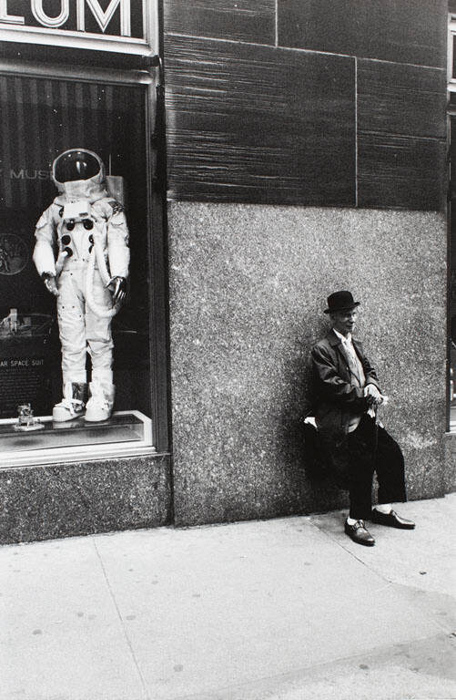 Rockefeller Center (Man and astronaut suit), from the portfolio Joel Meyerowitz Photographs, The Early Works
