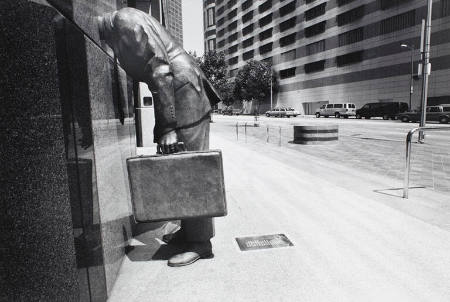 Sculpture of businessman on sidewalk, Los Angeles, CA