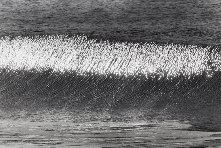 Sun reflected on wave face, Zuma Beach, CA