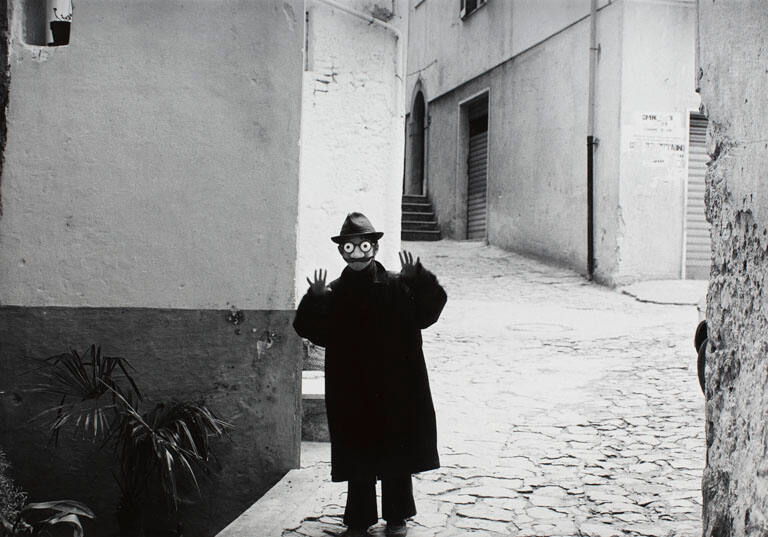Boy dressed for Carnivale, Itri (Italy), from the portfolio Journeys
