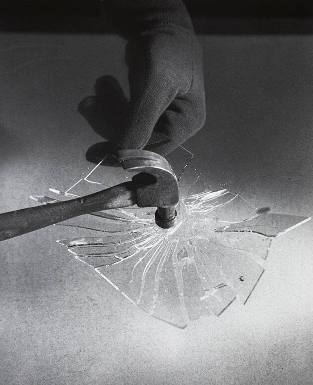 Hammer breaks glass plate