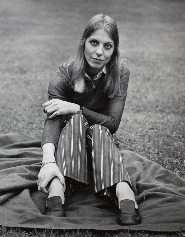 Portrait of a woman in striped pants, sitting, New Haven (?)