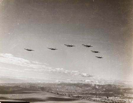 [Protective screen of six American P-38 fighter planes over Algeria, North Africa]