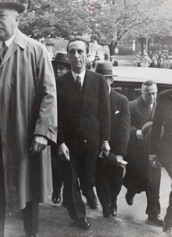 Dr. Goebbels arrives at the Bâtiment Electoral for the first time