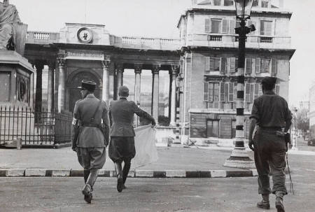 [German officer bearing a white flag surrenders during the Allied liberation of Paris]