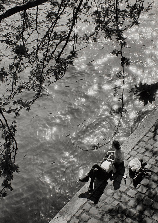 Lunch hour on the Seine just below Notre Dame Cathedral, Paris