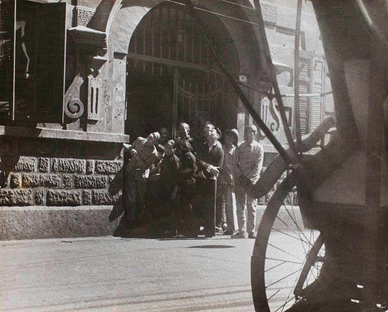 [Citizens watching in amazement the air battle over their city, Hankow, China]