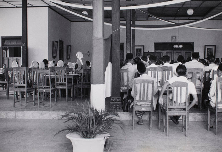 Meeting of the Mushumi (Muslim) Party where male and female delegates must sit separately, Jogjakarta, Java