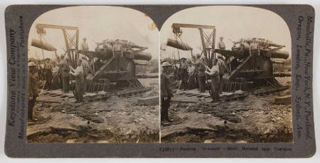 Feeding "Grannie"-Shell Hoisted into Position
