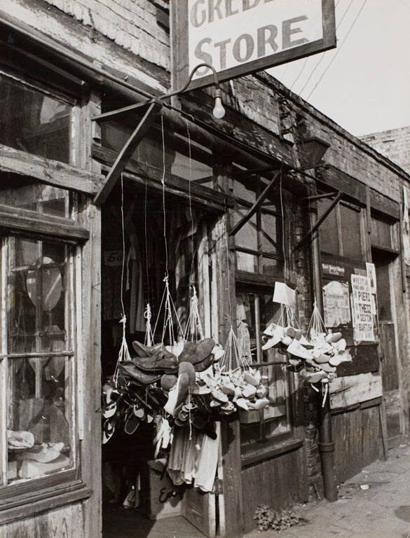 Shoes hanging in store front on Decatur Street, Atlanta, Georgia