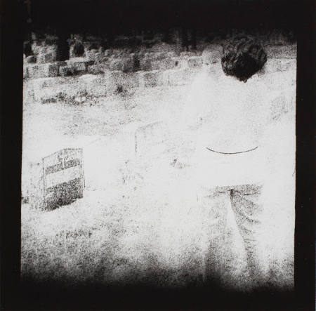 Mother and child {Maria and Adriana] in graveyard, New York City