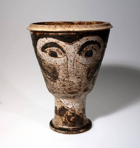 Vessel with an incised design of a woman's face